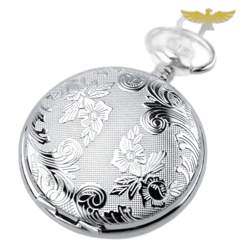 Zilverkleurig dameszakhorloge met dubbele klep en een mooi zilverkleurig bloemenpatroon