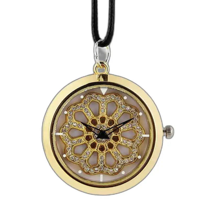 Chique gouden dameshorloge met hanger en bloemmotief