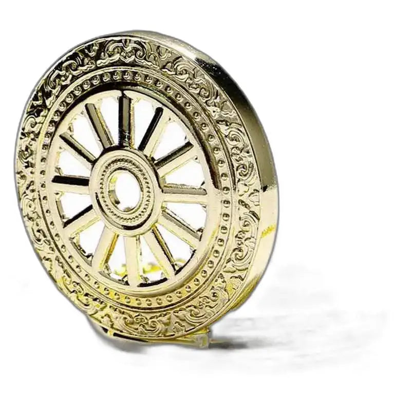Sierlijke gouden Dharma-wielen op luxe gouden granaatzakhorloge