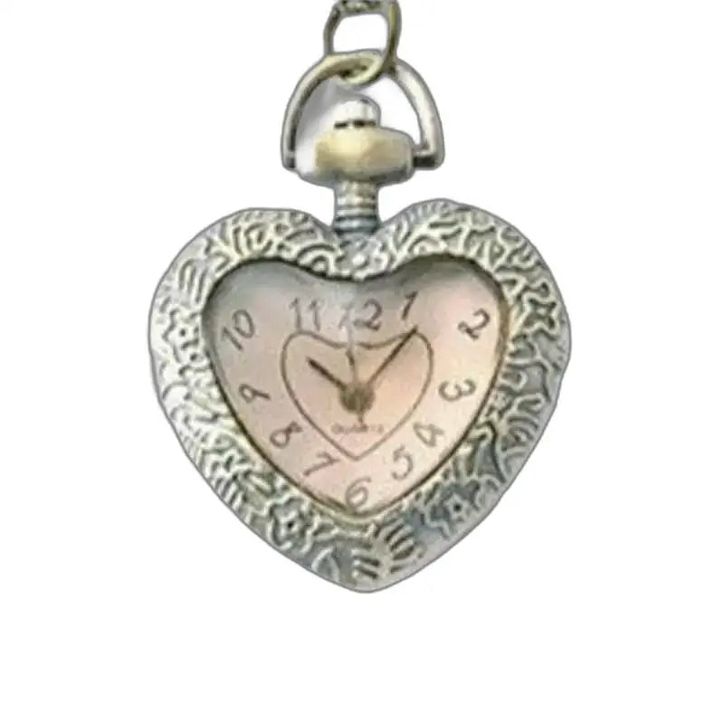 Elegant dameshorloge met lange ketting, lang kettinghorloge met decoratieve metalen kast in de vorm van een hart